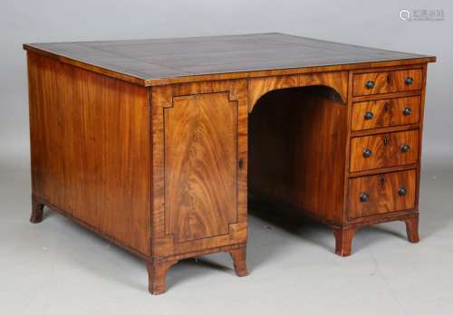 A Regency mahogany twin pedestal partners desk with ebony st...
