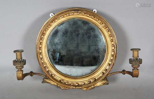 A Regency gilt wood and gesso framed convex girandole wall m...