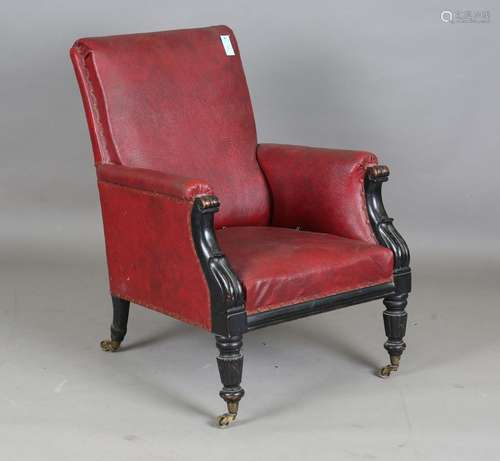 An early Victorian ebonized armchair