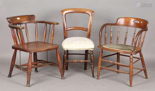 A late Victorian ash and elm tub back Windsor chair