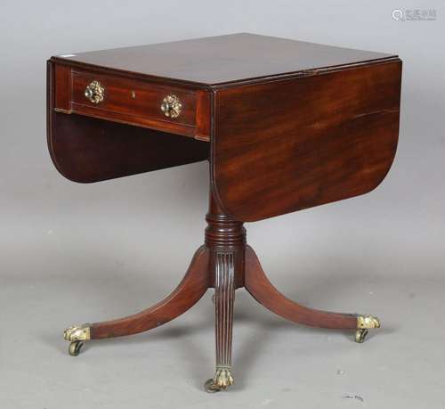 A Regency mahogany single pedestal Pembroke table