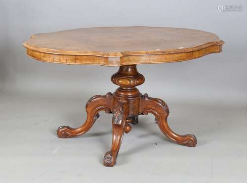 A Victorian burr walnut tip-top breakfast table of oval serp...