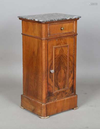 A late 19th century French walnut marble-topped bedside cabi...