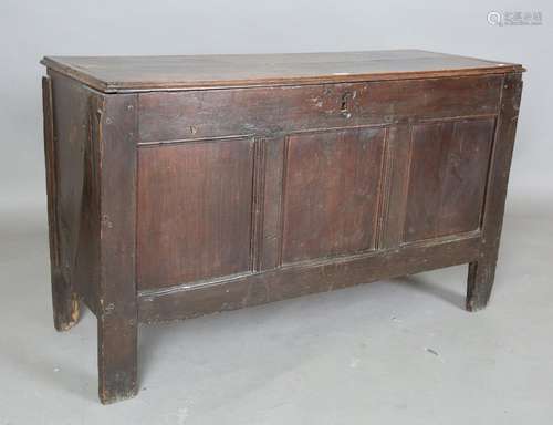 An 18th century oak coffer with triple panel front