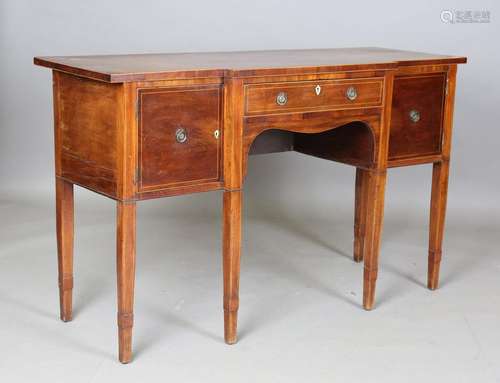 A George III mahogany breakfront sideboard with boxwood stri...