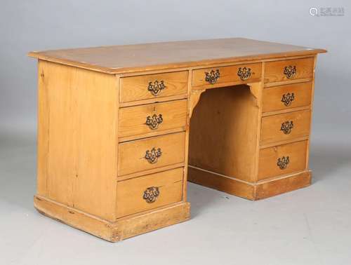 A late Victorian pine twin pedestal desk