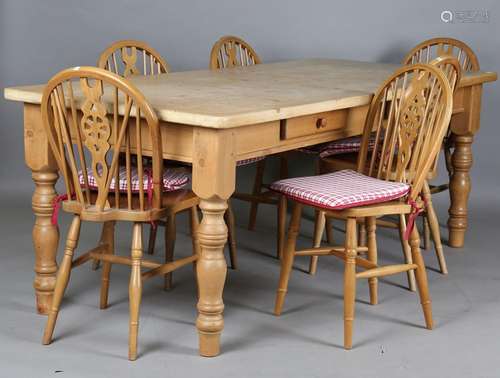 A modern Victorian style pine kitchen table