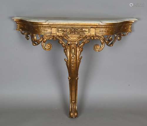 A 19th century gilt painted composition console table with a...