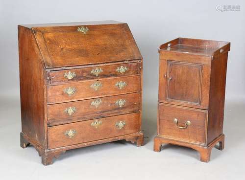 An 18th century oak night cupboard