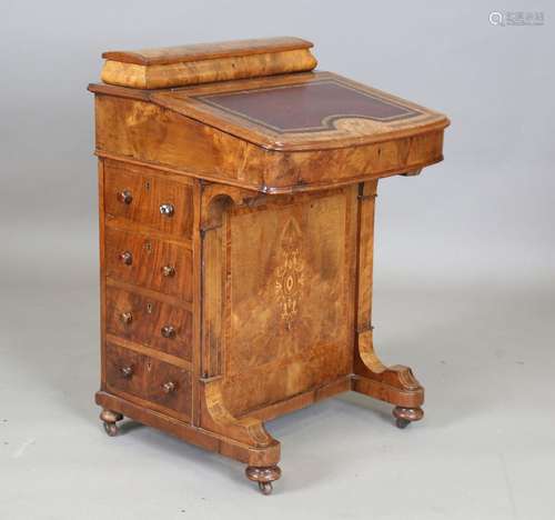 A late Victorian burr walnut and crossbanded Davenport with ...