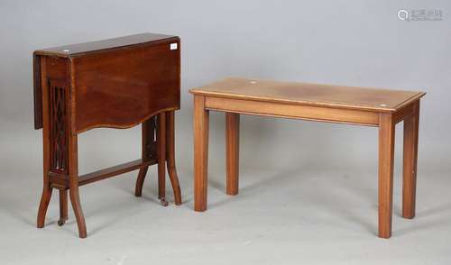 An Edwardian mahogany Sutherland table with satinwood crossb...