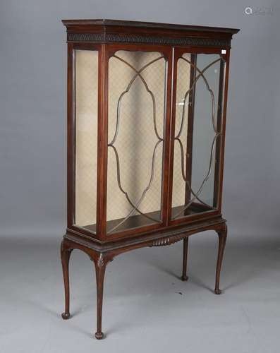 An early 20th century mahogany glazed display cabinet with b...