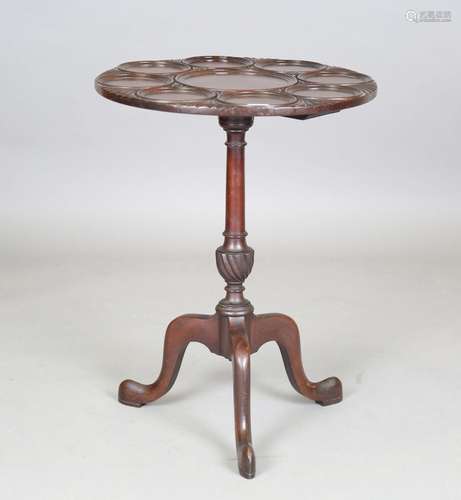 A 19th century George III style mahogany tripod tea table of...