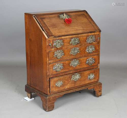 A small George III oak bureau