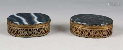 Two late 19th century gilt metal oval trinket boxes