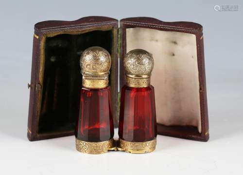 A late Victorian ruby glass and silver gilt folding 'binocul...