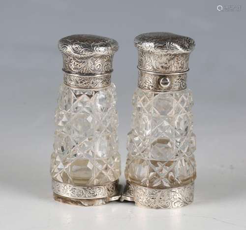 A late Victorian cut glass and silver folding 'binocular' sc...