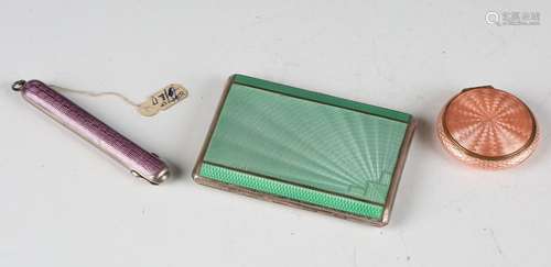 An Art Deco silver and green enamel cigarette case