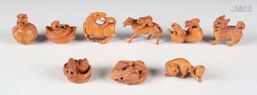 A group of nine modern Japanese carved boxwood Netsuke