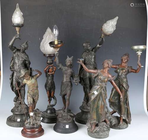 A group of six early 20th century spelter figural table lamp...