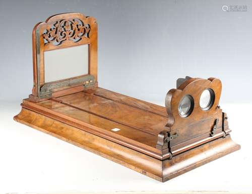 A Victorian walnut table-top stereoscopic viewer