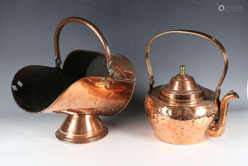 A large Victorian copper kettle with folding handle