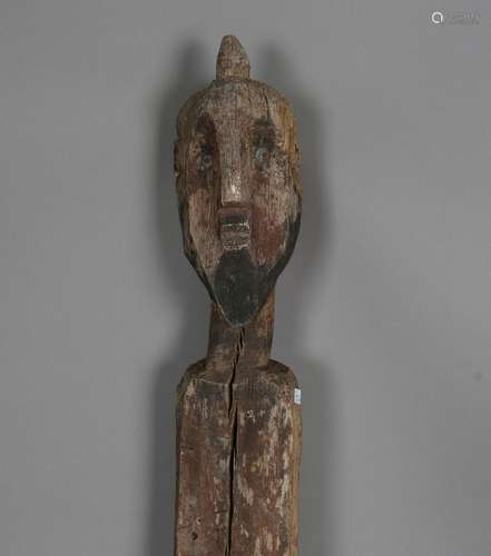 An Ethiopian carved wooden figural marker post