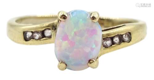 9ct gold single stone oval opal ring with cubic zirconia set...