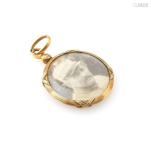 Pendentif porte photo en or jaune 18K (750/°°). Poids brut :...