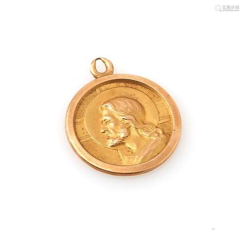 Médaille religieuse en or jaune 18K (750/°°). Poids brut : 2...