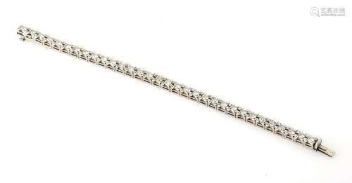 Bracelet ligne en or gris 18K (750/°°), à maillons articulés...
