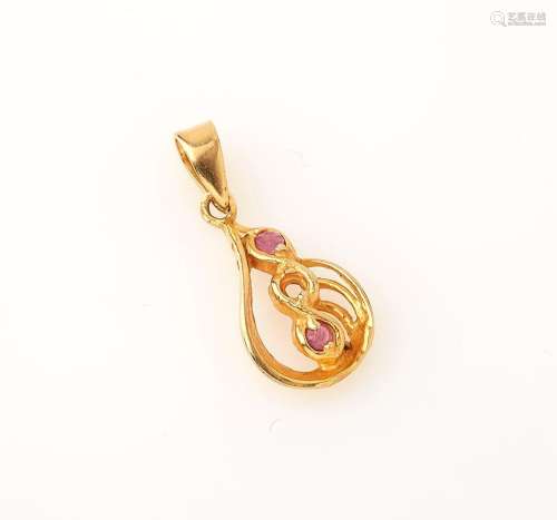 Pendentif en or jaune 18K (750/°°) figurant un motif ovale s...