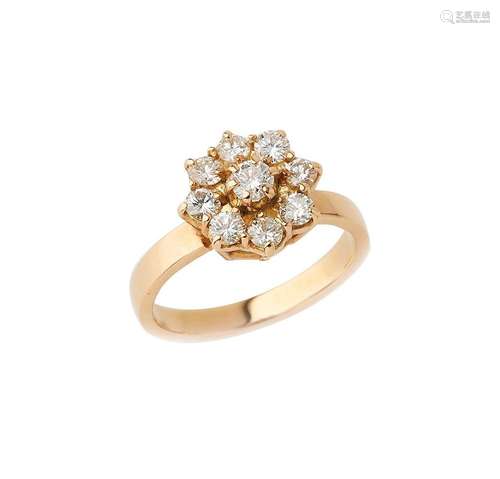 Bague Fleur en or jaune 18K (750/°°), centré d une émeraude ...