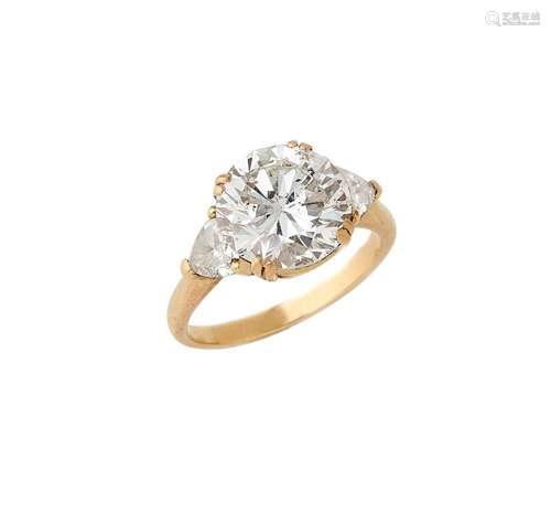 Bague solitaire en or jaune 18K (750/°°), ornée d un diamant...