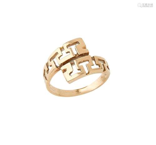 Bague croisée en or jaune 18k (750/°°), motif ajouré stylisé...