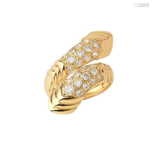 Bague croisée en or jaune 18K (750/°°), motifs godronnés, ce...