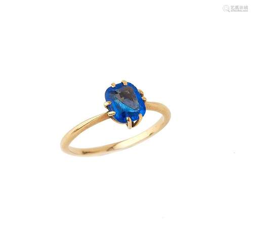 Bague en or jaune 18K (750/°°), ornée d une pierre bleue en ...