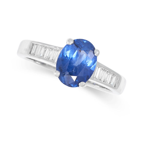 A SAPPHIRE AND DIAMOND RING set with an oval cut sapphire of...