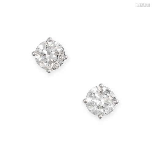 A PAIR OF DIAMOND STUD EARRINGS each set with a round brilli...