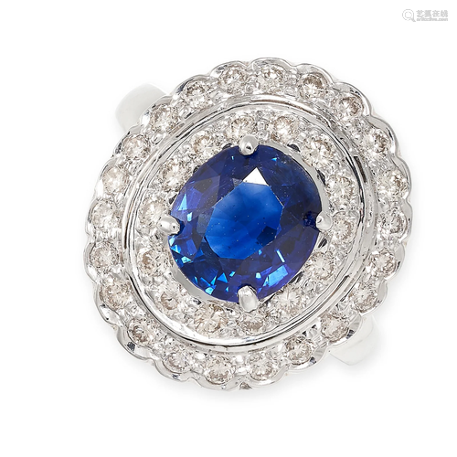 A SAPPHIRE AND DIAMOND RING in 18ct white gold, set with an ...