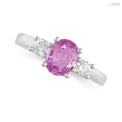 A PINK SAPPHIRE AND DIAMOND THREE STONE RING in 18ct white g...