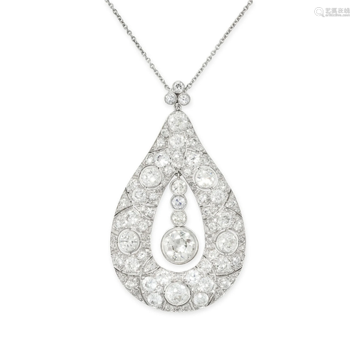 A DIAMOND PENDANT NECKLACE comprising a tear shaped pendant ...