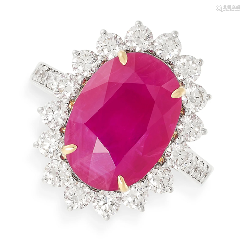 A RUBY AND DIAMOND RING set with an oval cut ruby of 6.97 ca...