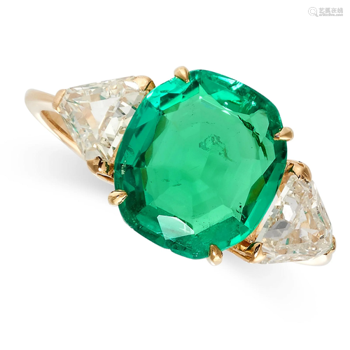 A FINE COLOMBIAN EMERALD AND DIAMOND RING set with a cushion...