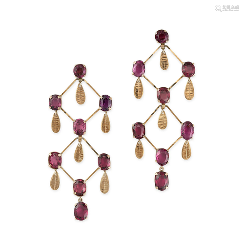 A PAIR OF GARNET CHANDELIER EARRINGS in yellow gold, each se...