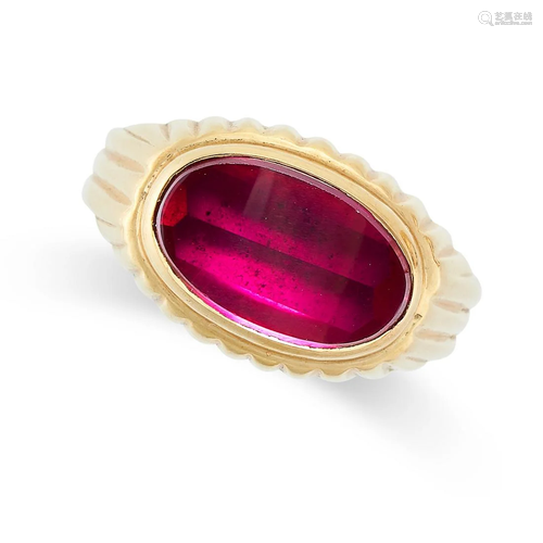 A VINTAGE SYNTHETIC RUBY RING in yellow gold, set with an ov...