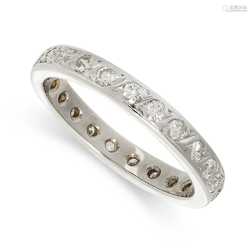 A FULL DIAMOND ETERNITY RING set with a row of twenty three ...