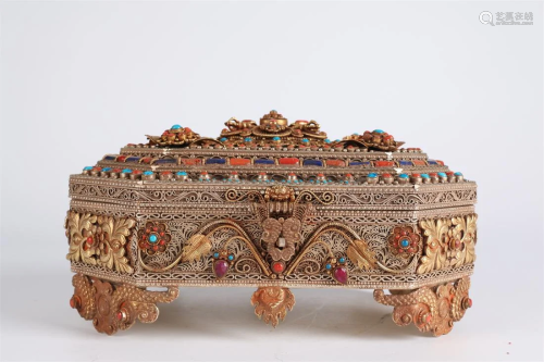 A SILVER JEWELRY BOX, INLAID WITH JEWELS.