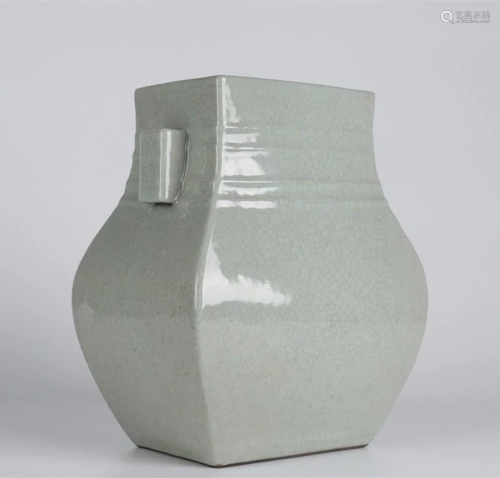 A PORCELAIN BOTTLE WITH PIERCED EARS, GE KILN.