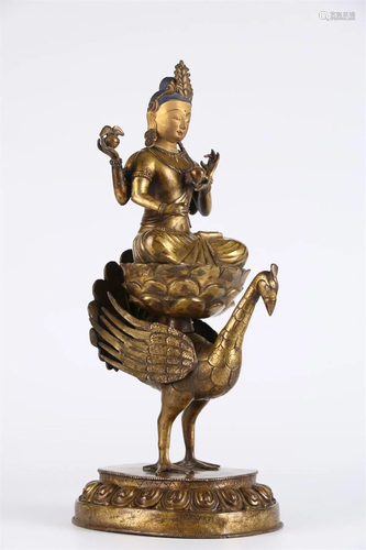 A TIBETAN MAHA-MAYURIVIDYA-RAJNI BUDDHA STATUE.